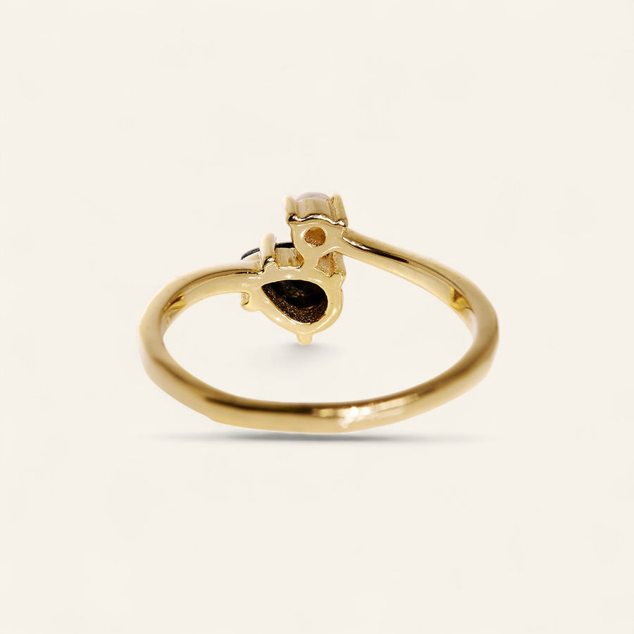 The 6x4 Pear & Round Gemini Ring