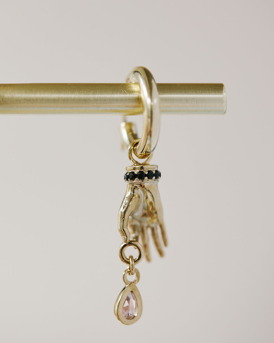 The Pinched Hand Charm