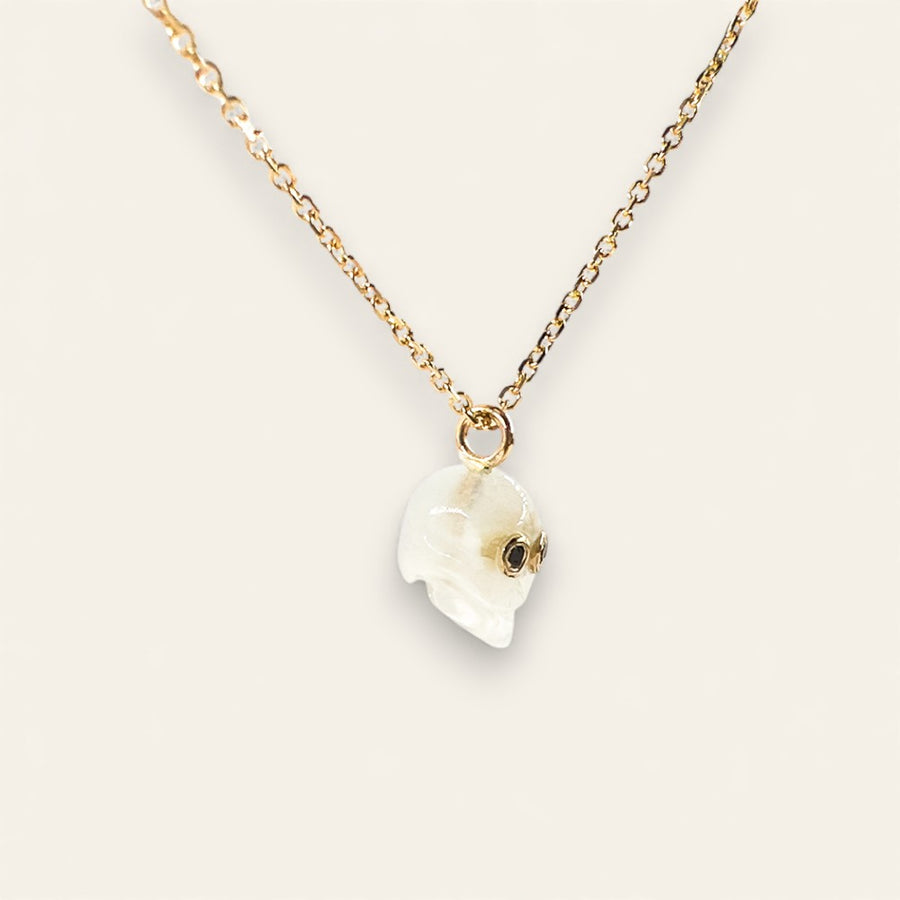 The Moonstone Skull Charm with Black Diamond Eyes