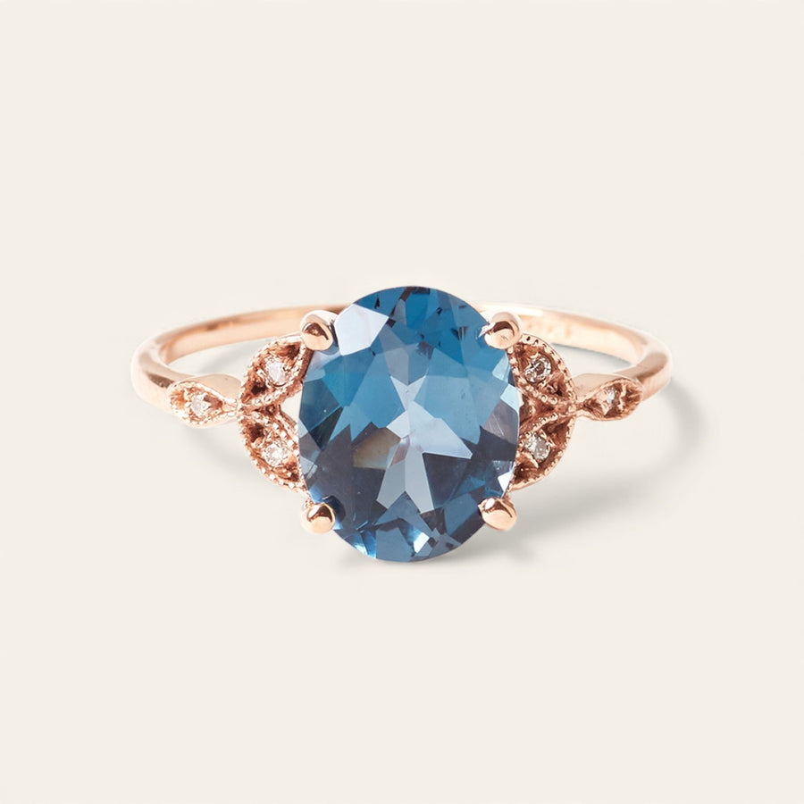 The Tri Diamond Oval Cut Stone Ring in Rose Gold