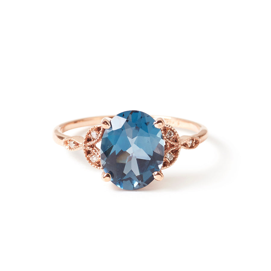 The Tri Diamond Oval Cut Stone Ring in Rose Gold