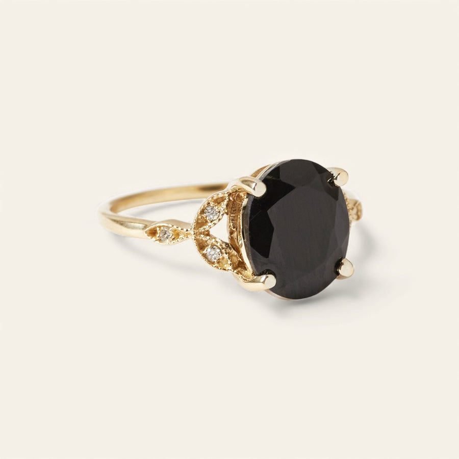 The Tri Diamond Oval Cut Stone Ring