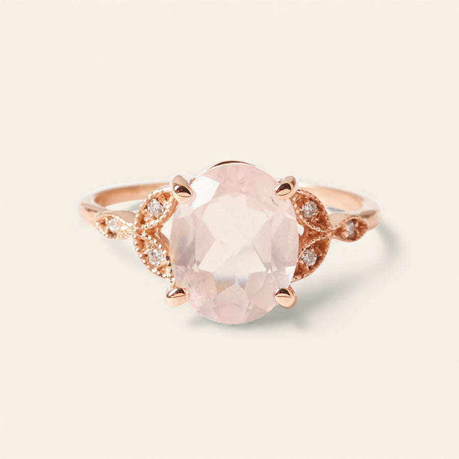 The Tri Diamond Oval Cut Stone Ring in Rose Gold