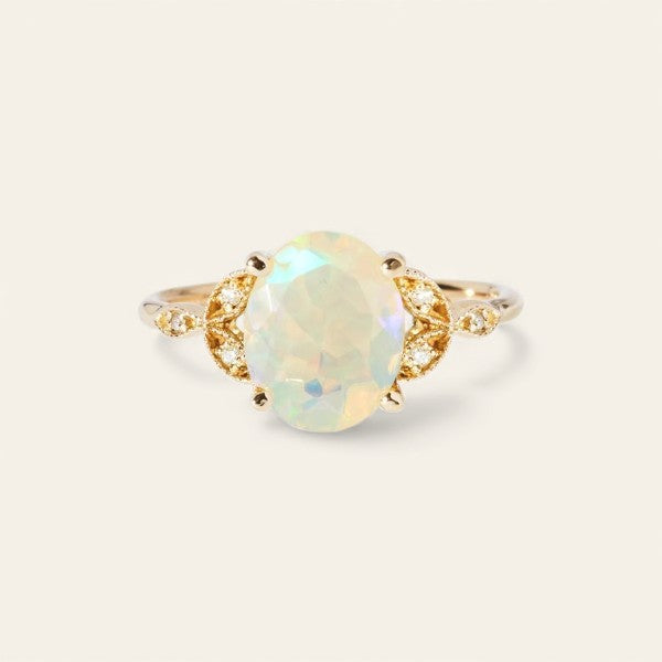 The Tri Diamond Oval Cut Stone Ring