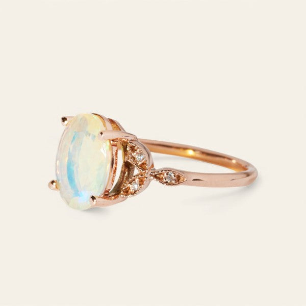 The Tri Diamond Oval Cut Stone Ring in Rose Gold